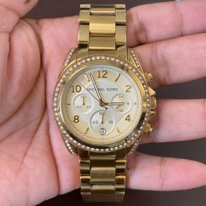 MK gold watch